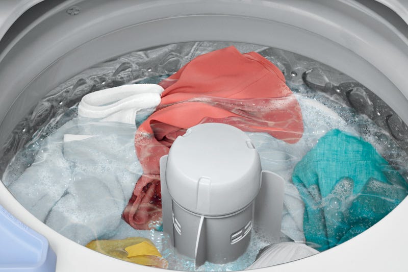 Washing machine filling with clean water.