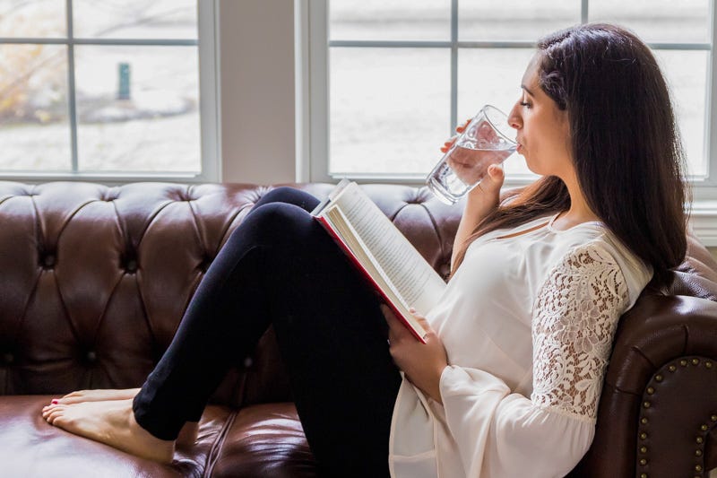 Woman drinking clean water.